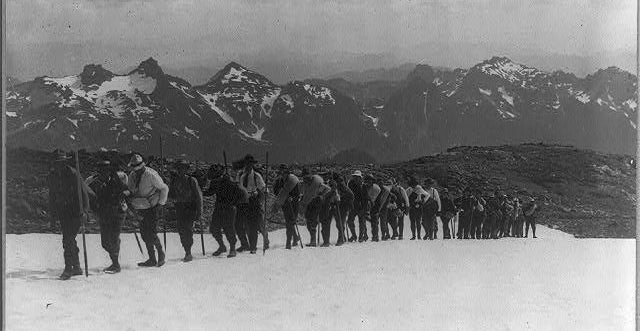 Vintage black and white photograph of a YMCA climbing party on Mount Rainier.